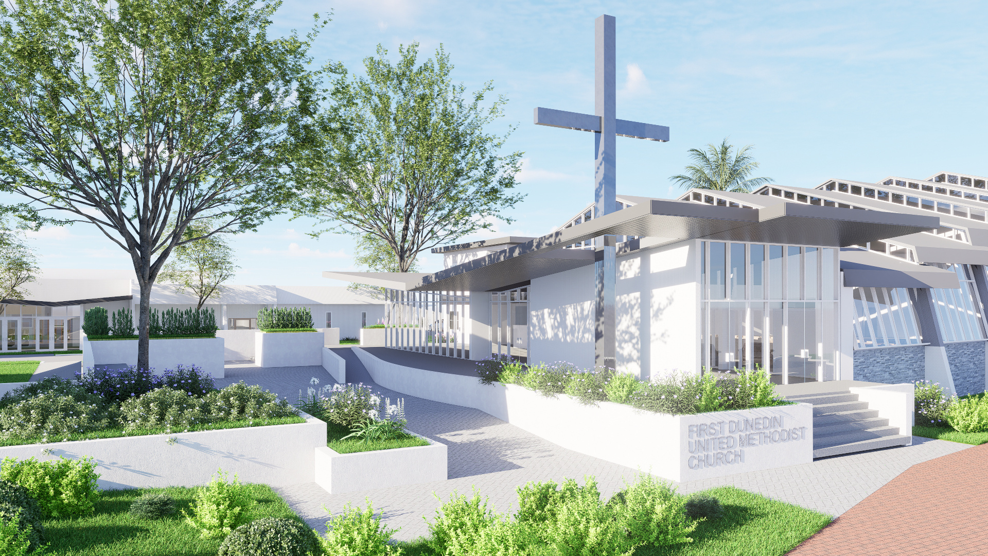 Image of church with modern style renovation work including expansive windows and a peaceful prayer garden