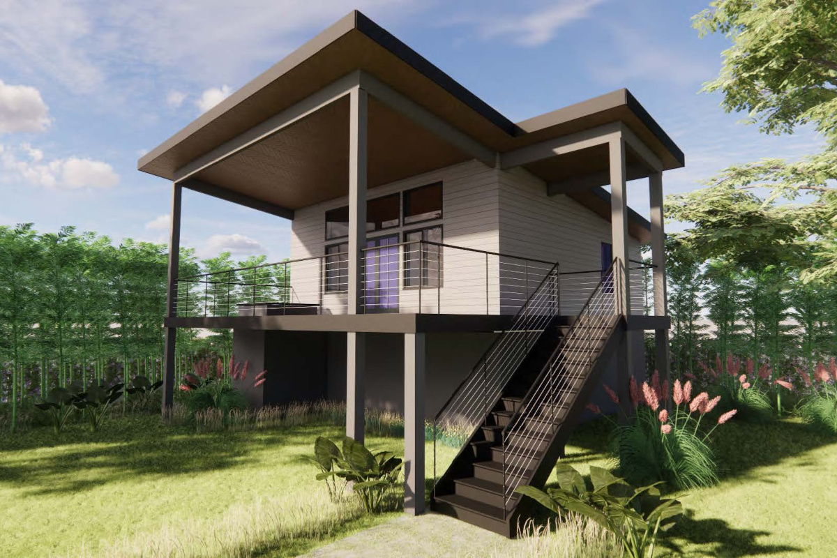 Image of small accessory dwelling unit in earth tones with stairs leading up to unit